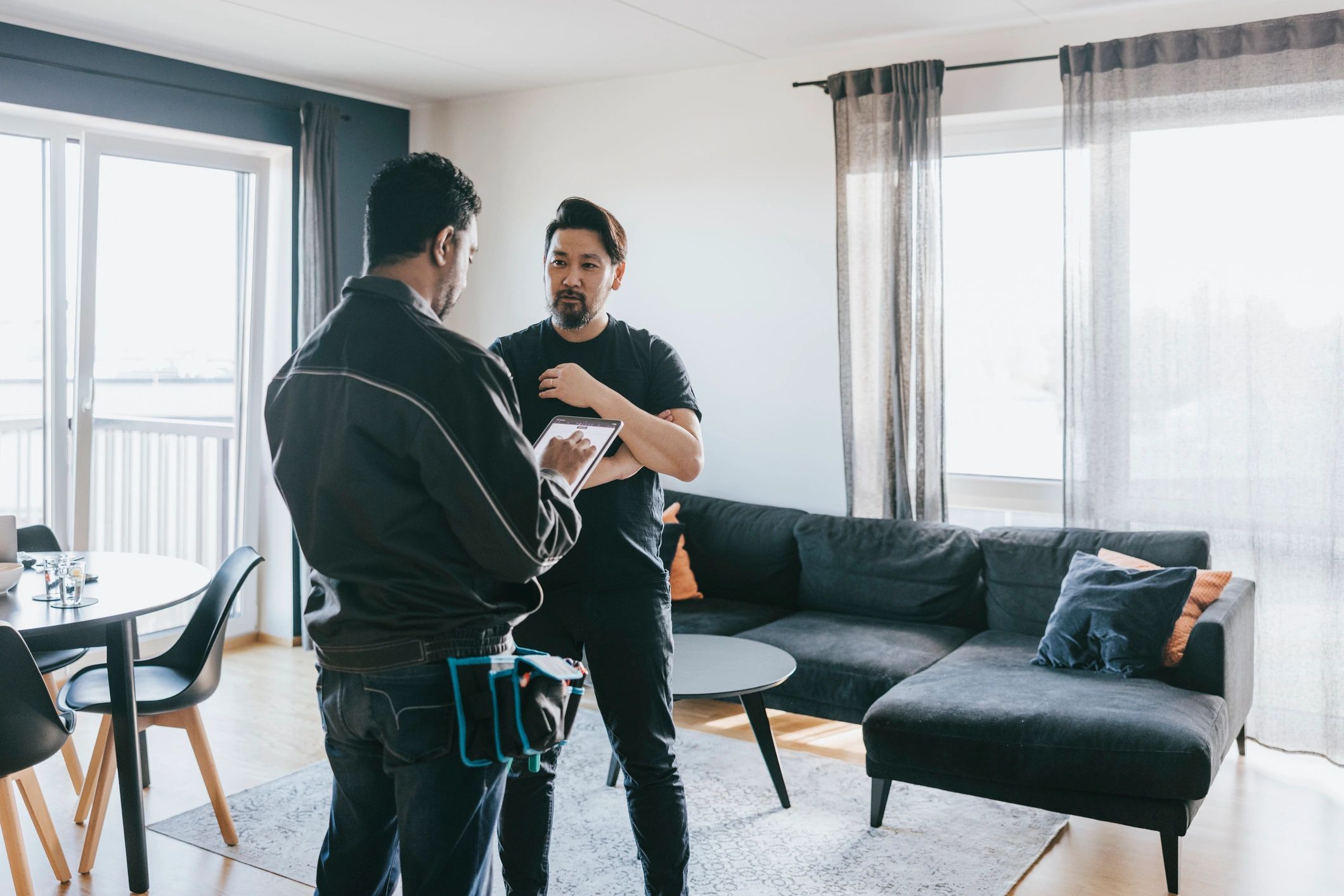 Home service professional consulting with a customer