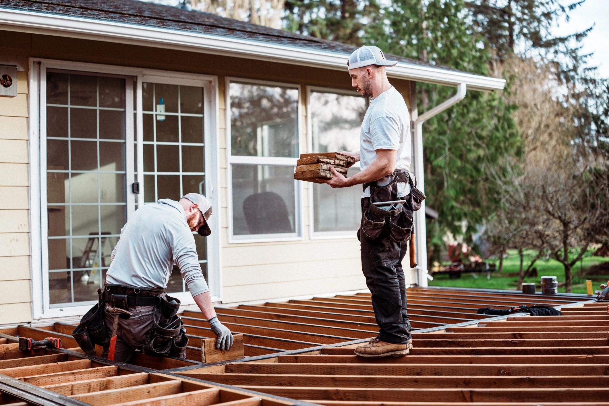 Home service professionals collaborating on a residential project